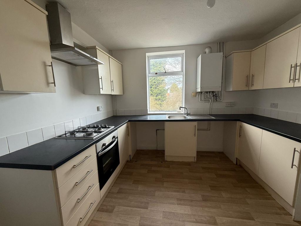 Property photo 3 of 7 Kitchen