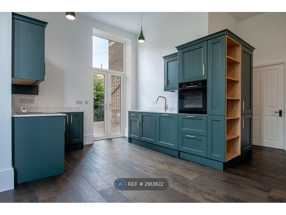 Property photo 3 of 12 Kitchen