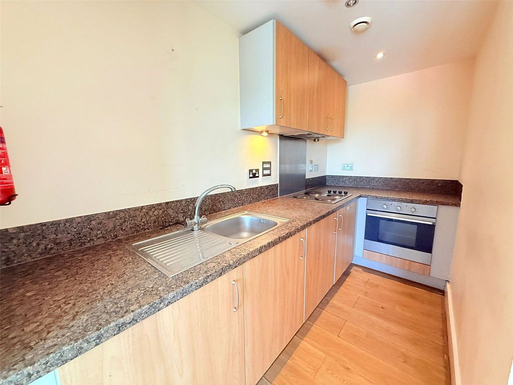 Property photo 3 of 7 Kitchen