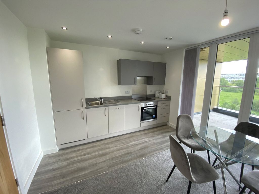 Property photo 3 of 7 Kitchen