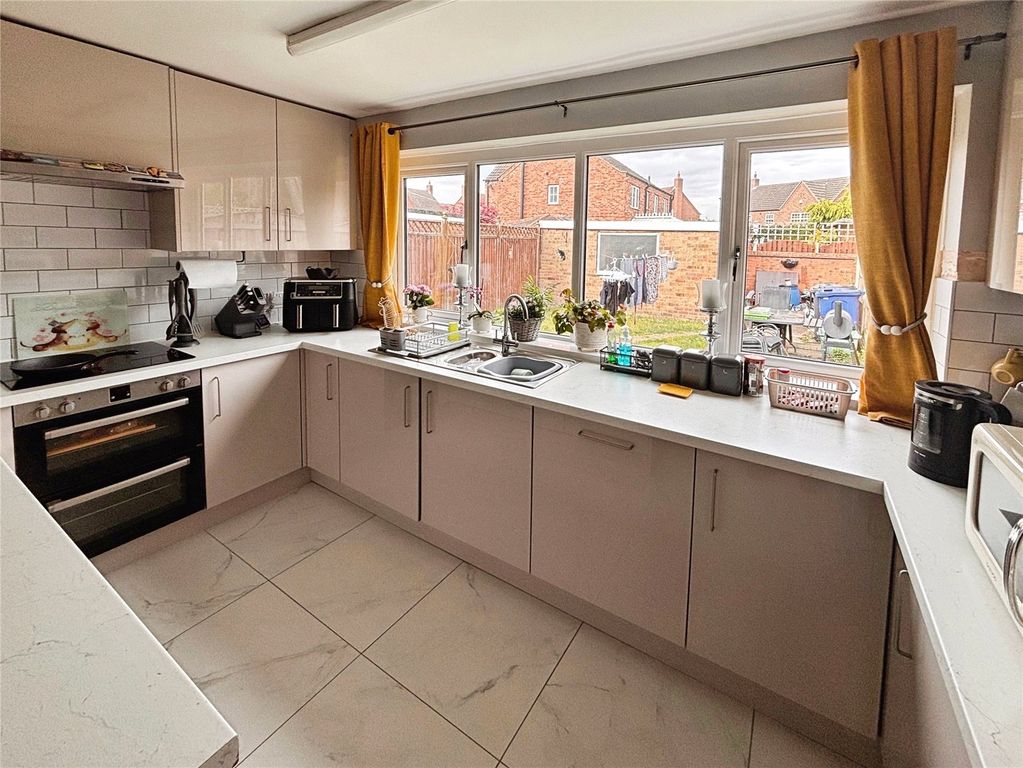 Property photo 2 of 15 Kitchen Area