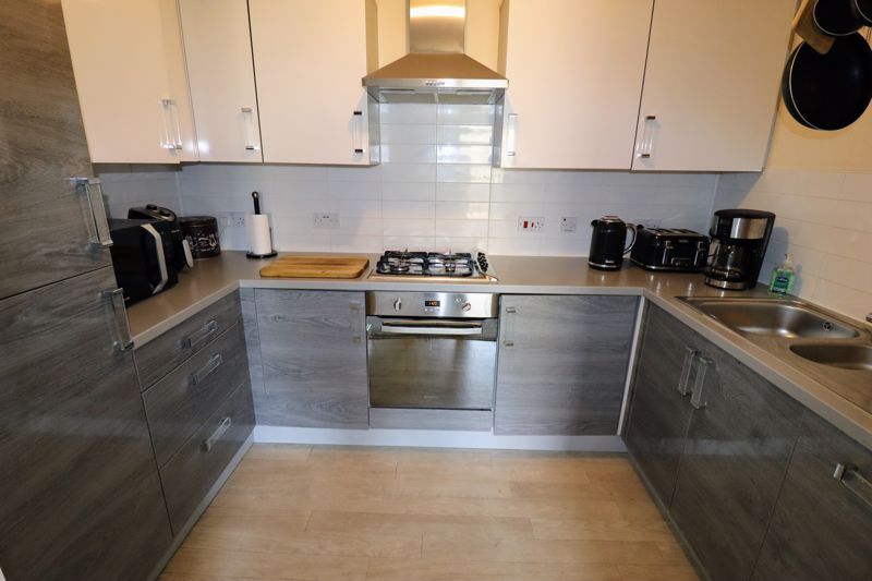 Property photo 3 of 12 Kitchen