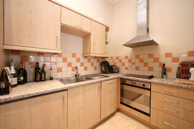 Property photo 3 of 8 Kitchen
