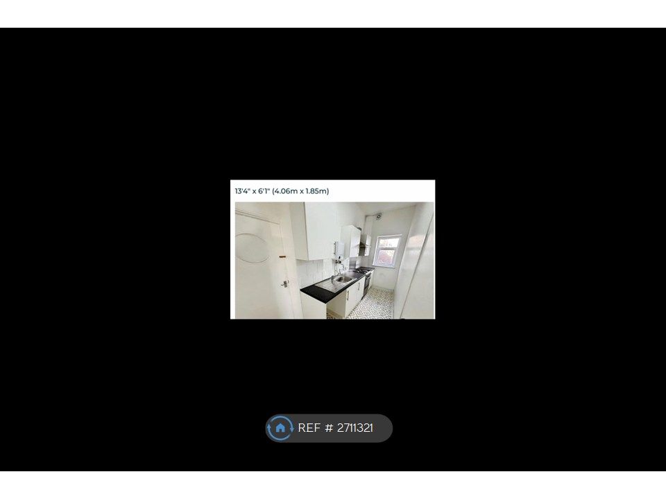 Property photo 3 of 5 Galley Kitchen W/Separate Utility