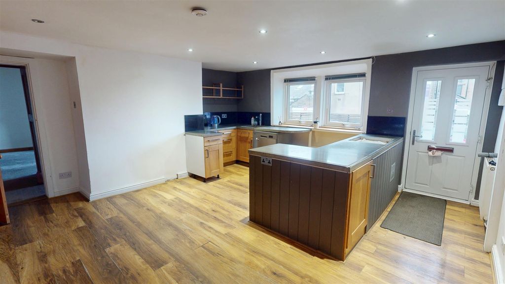 Property photo 2 of 12 Dining Kitchen