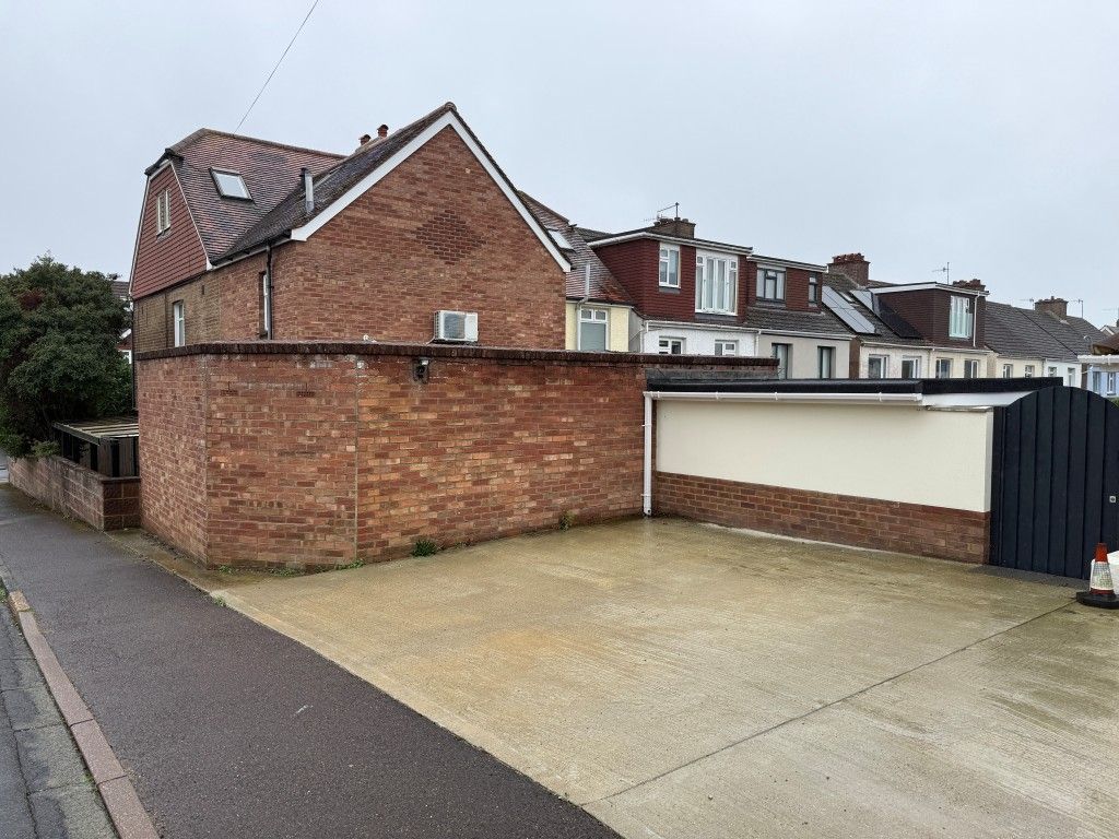Property photo 2 of 16 Rear Elevation With Parking Area