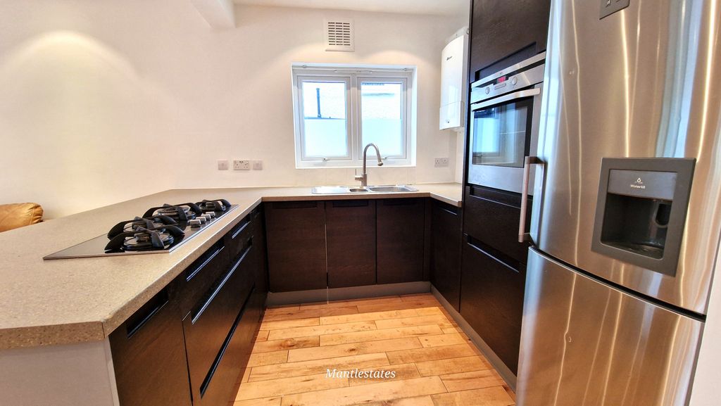 Property photo 2 of 21 Kitchen Area