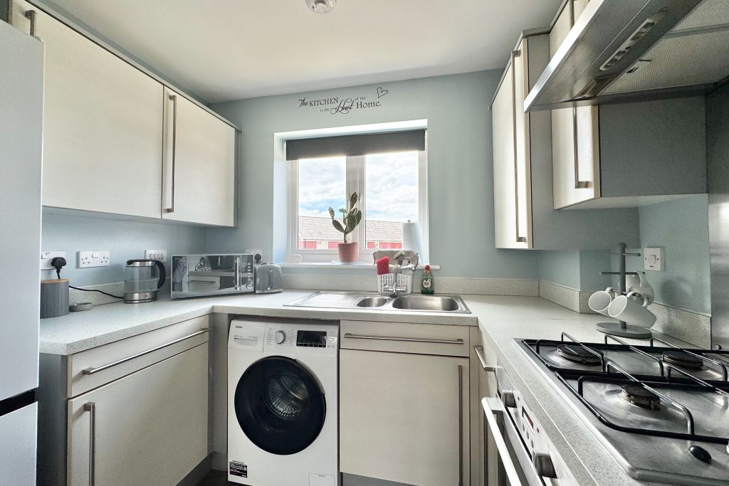 Property photo 3 of 13 Kitchen
