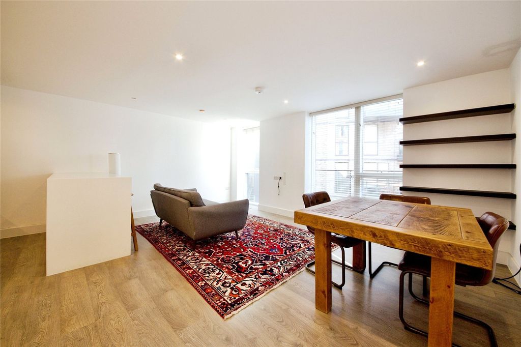 Property photo 3 of 12 Living Area