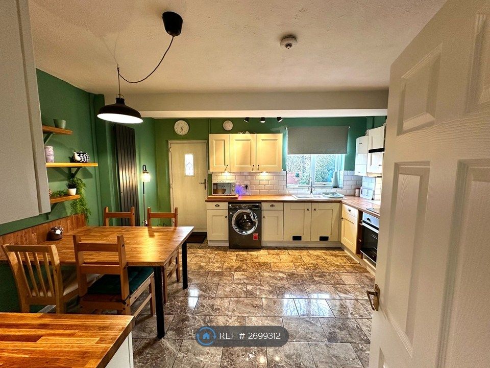 Property photo 2 of 34 Dining Kitchen