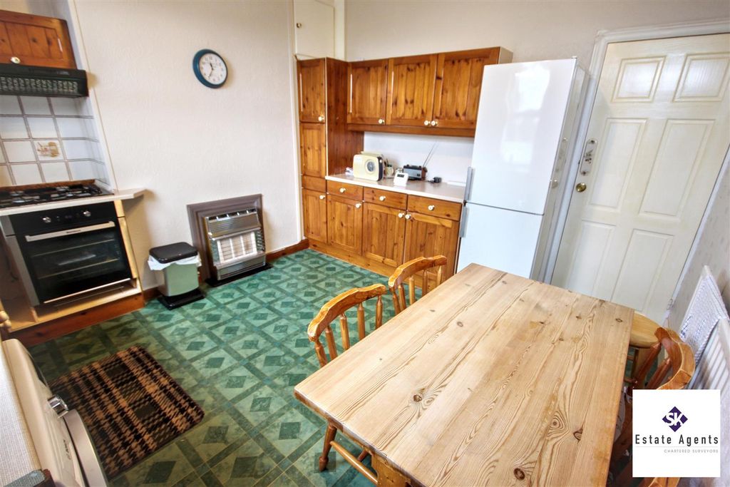 Property photo 2 of 13 Dining Kitchen