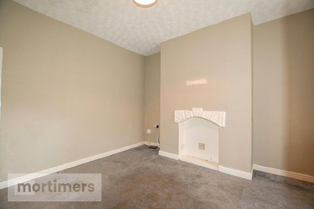 Property photo 2 of 12 Living Room