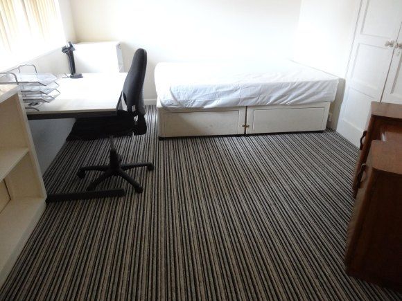 Property photo 2 of 9 Back Bedroom