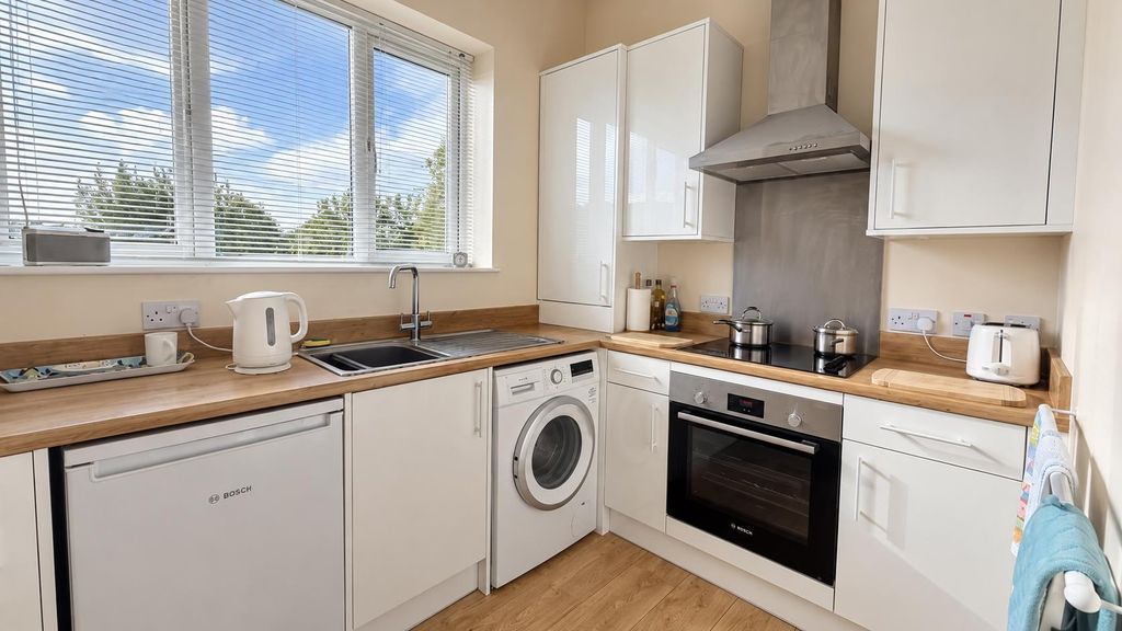 Property photo 2 of 12 Kitchen