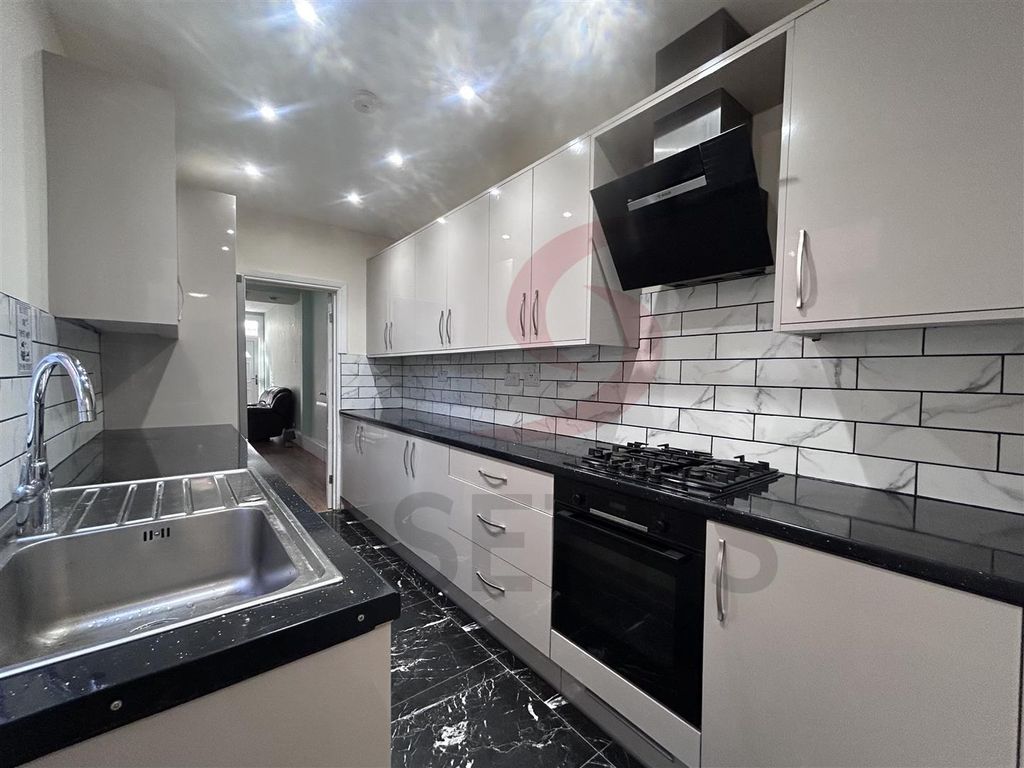 Property photo 3 of 16 Kitchen