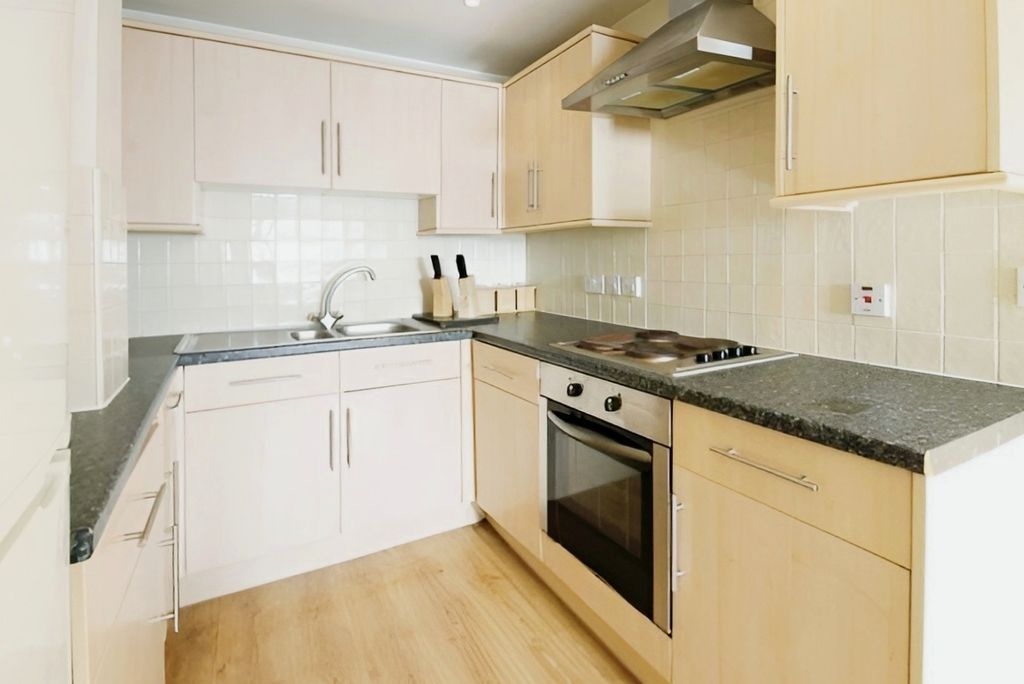 Property photo 1 of 11 Kitchen Area