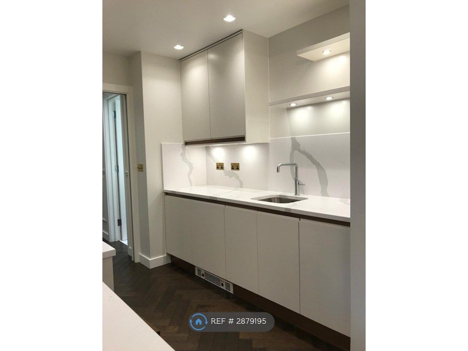 Property photo 3 of 9 Kitchen Area