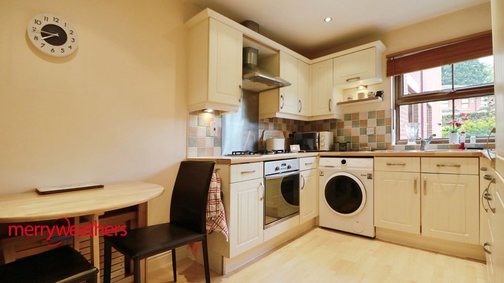 Property photo 2 of 13 Dining Kitchen