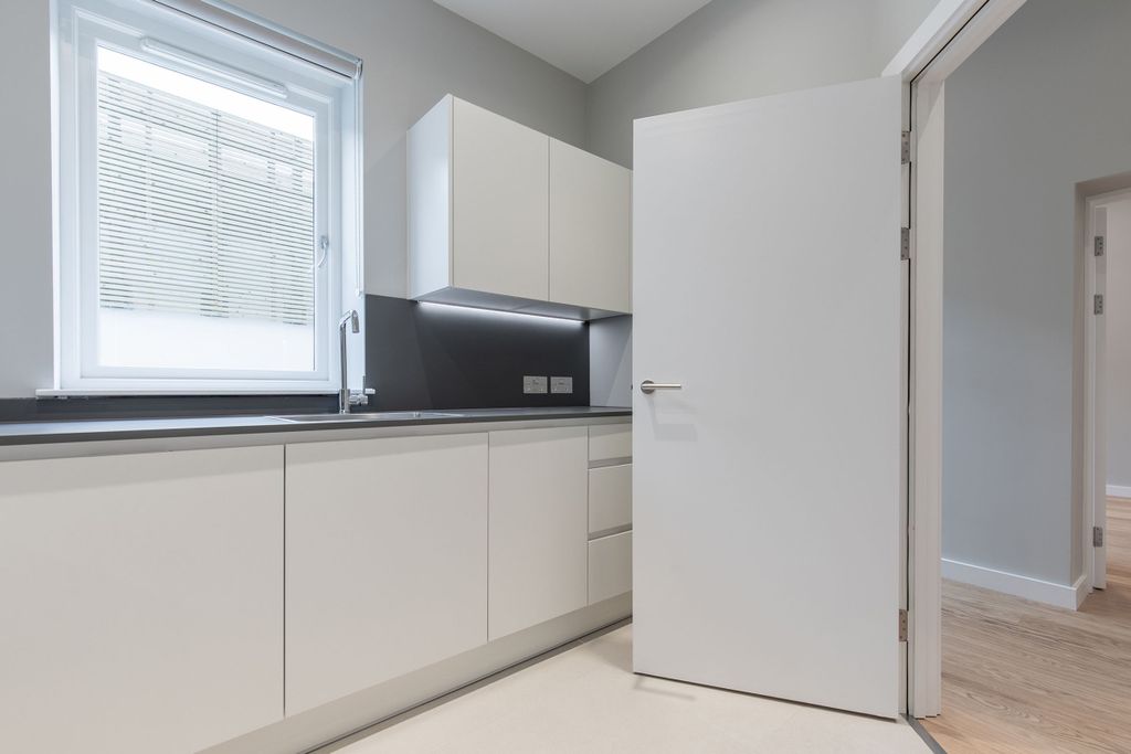 Property photo 3 of 16 Kitchen