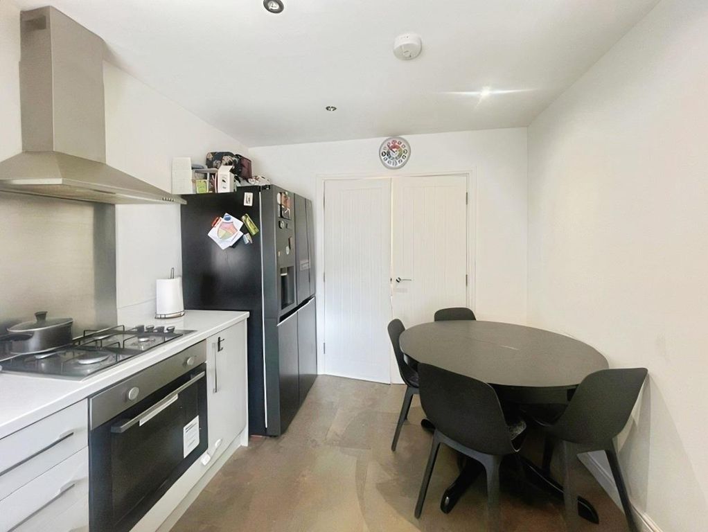 Property photo 2 of 13 Dining Kitchen