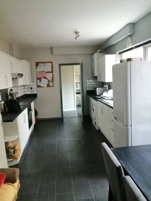Property photo 1 of 5 Modern Kitchen With Ample Storage And Workspace, F...