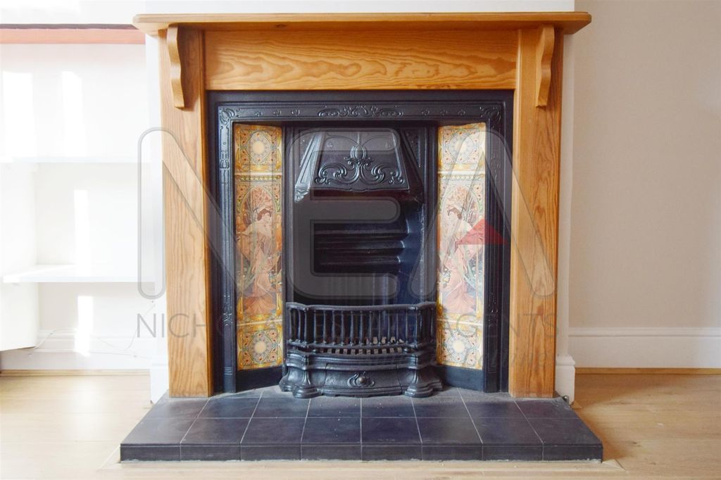 Property photo 3 of 13 Fireplace