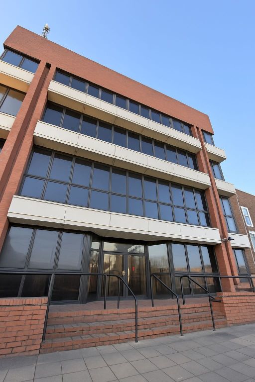 Property photo 1 of 4 Contemporary Multi-Storey Brick-And-Glass Building...