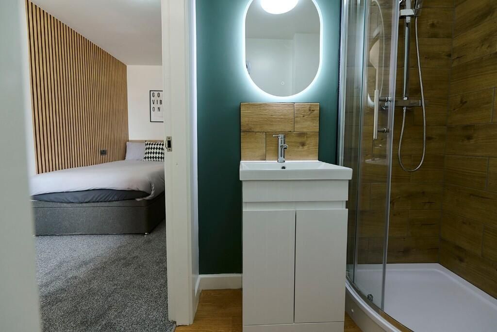 Property photo 3 of 13 A Modern Master Bedroom With A Cozy Double Bed, Fe...