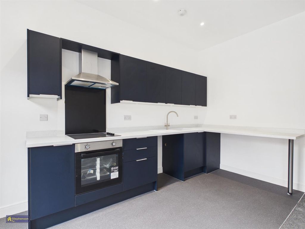 Property photo 3 of 9 Kitchen Area