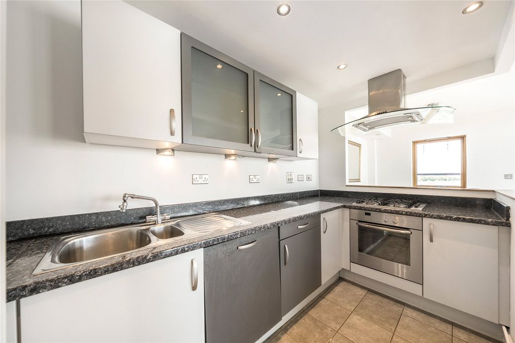 Property photo 3 of 8 Kitchen
