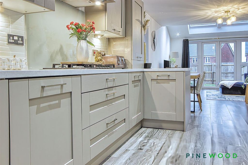 Property photo 3 of 27 Kitchen/Dining/Living Room