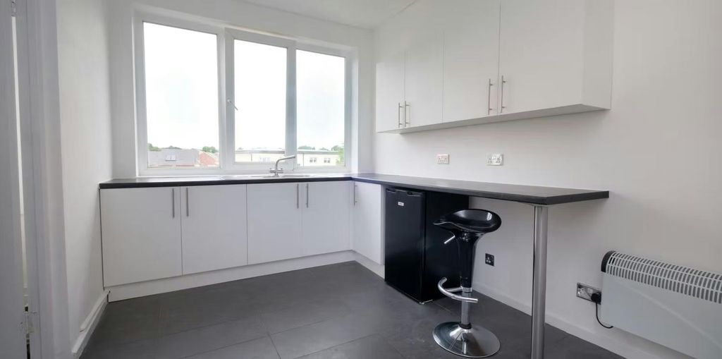 Property photo 3 of 7 Unit-2-Upstairs-Kitchen.Jpg