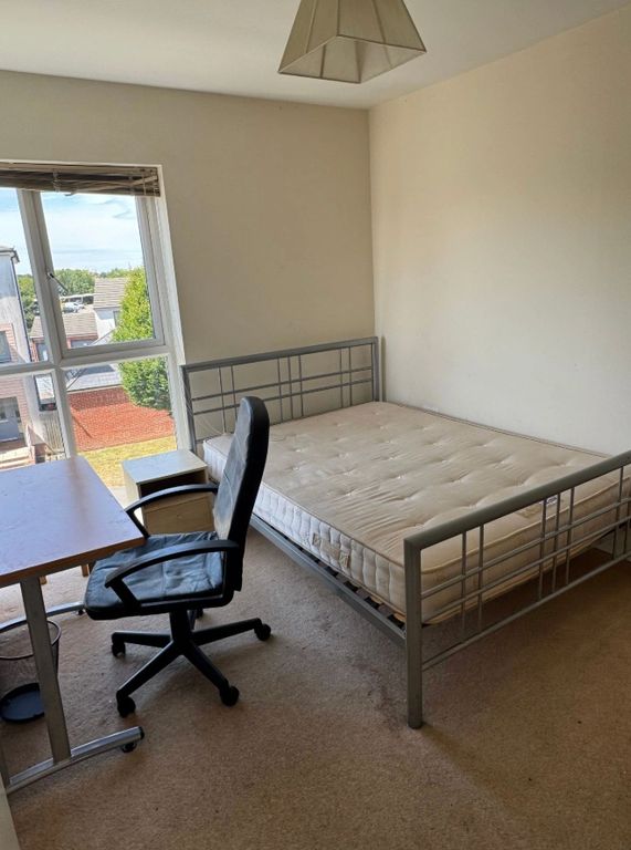 Property photo 1 of 6 Bright Bedroom With A Metal Double Bed Frame, A De...