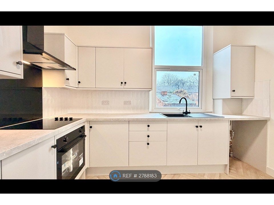 Property photo 2 of 8 Kitchen