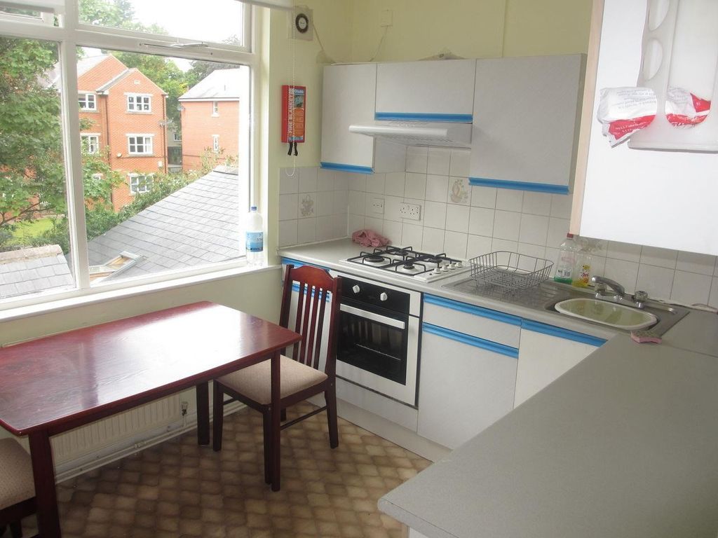 Property photo 3 of 5 Bright And Functional Kitchen With Ample Natural l...