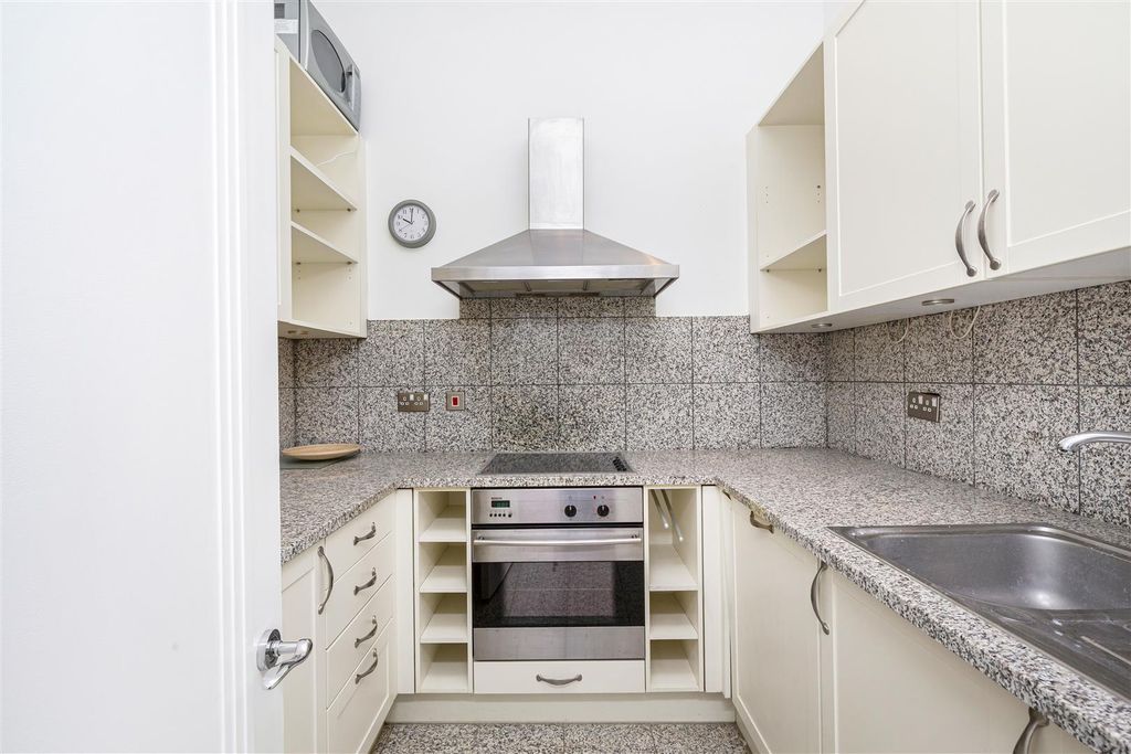 Property photo 2 of 12 Kitchen