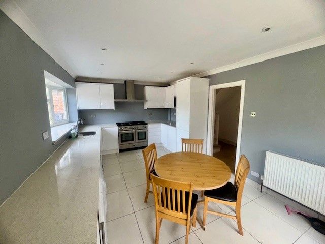 Property photo 2 of 12 Kitchen