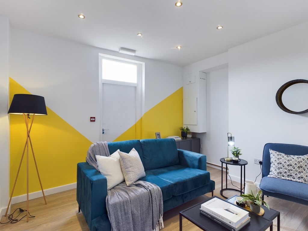 Property photo 3 of 5 A Vibrant And Inviting Large Modern Living Room Fe...