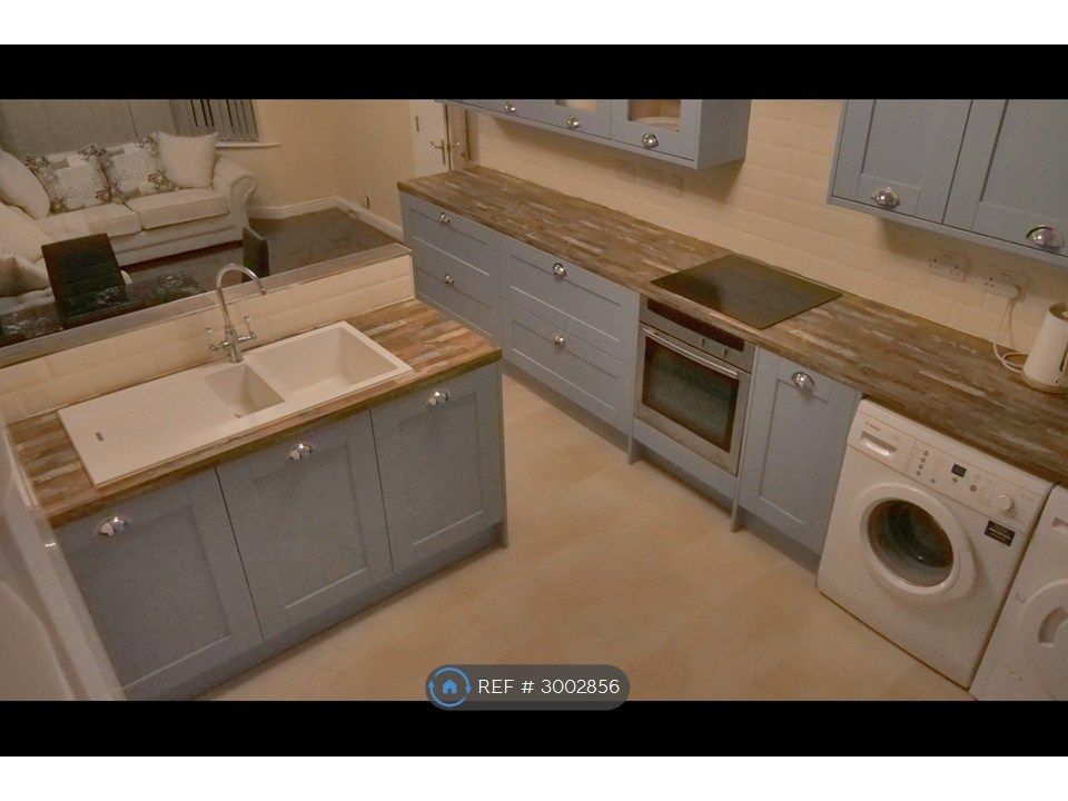 Property photo 3 of 8 Kitchen Area
