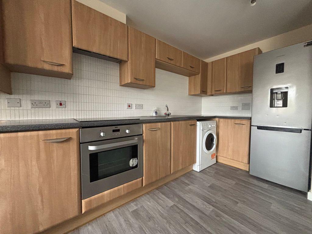 Property photo 3 of 7 Kitchen
