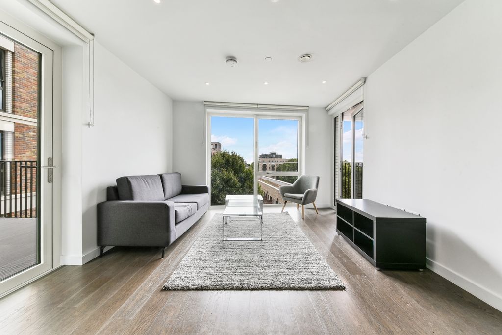 Property photo 1 of 9 Living Area