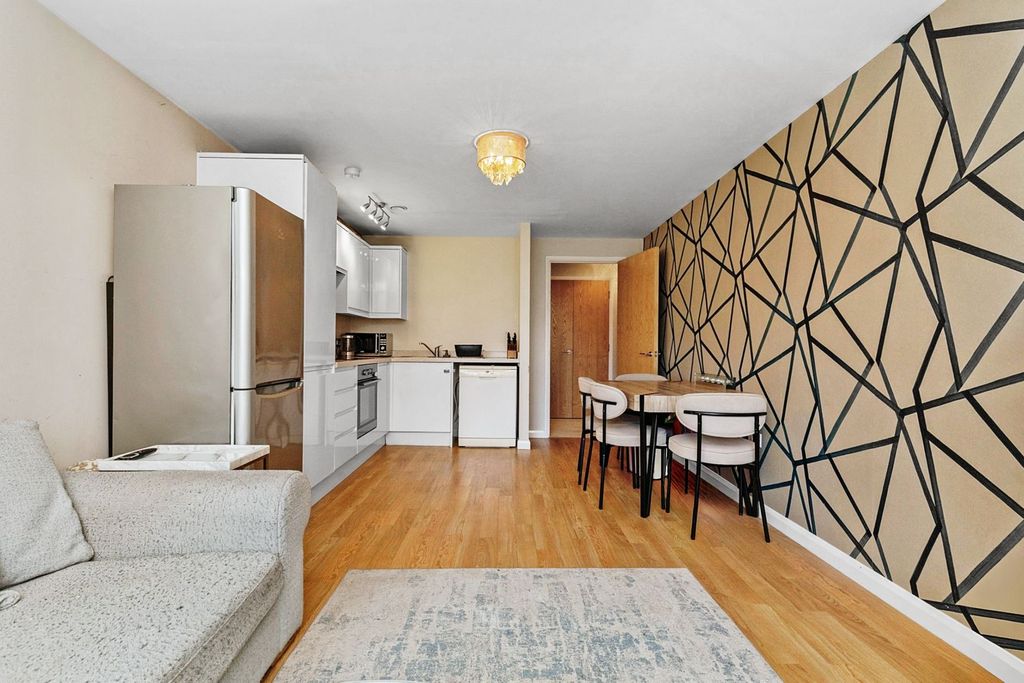 Property photo 3 of 12 Living / Dining Room