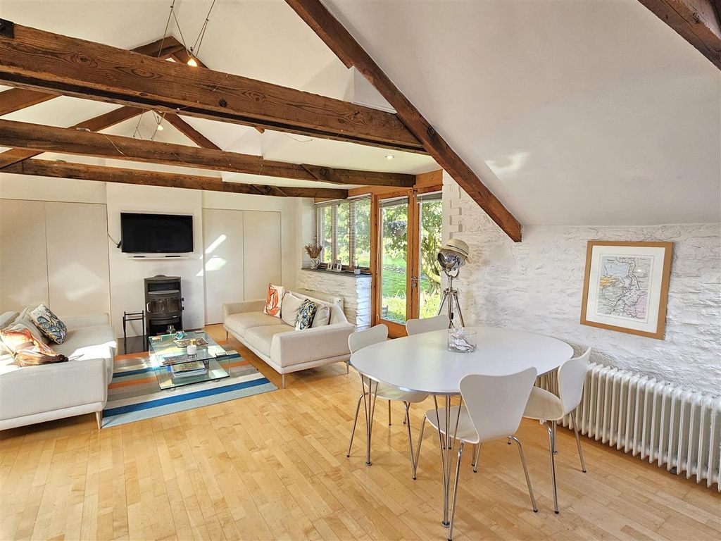 Property photo 1 of 13 Table And Living Area
