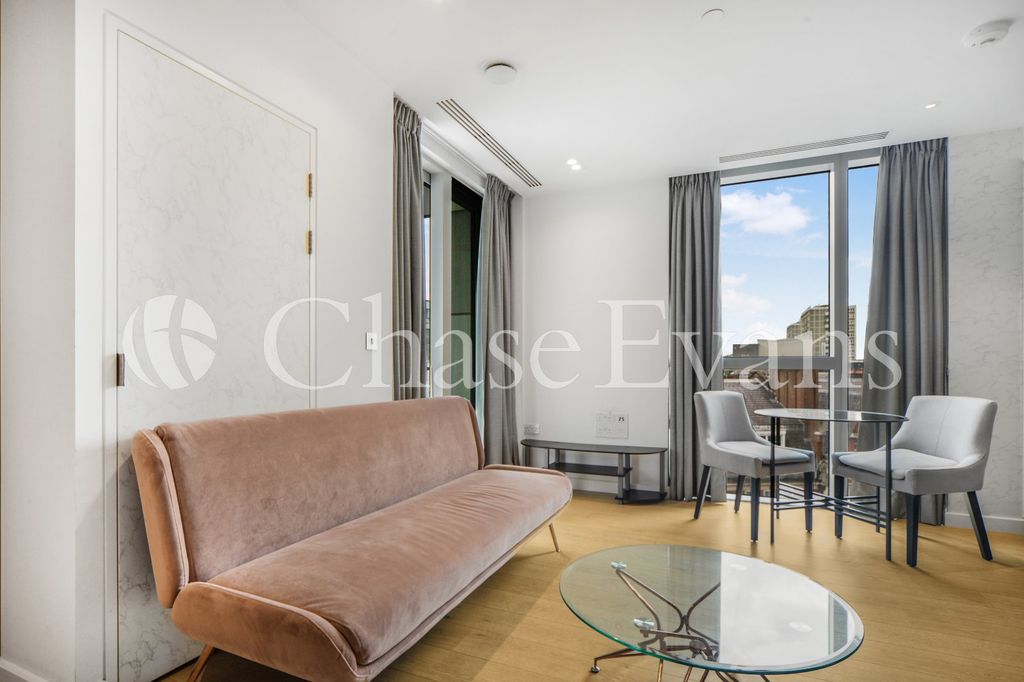 Property photo 3 of 16 Living Area