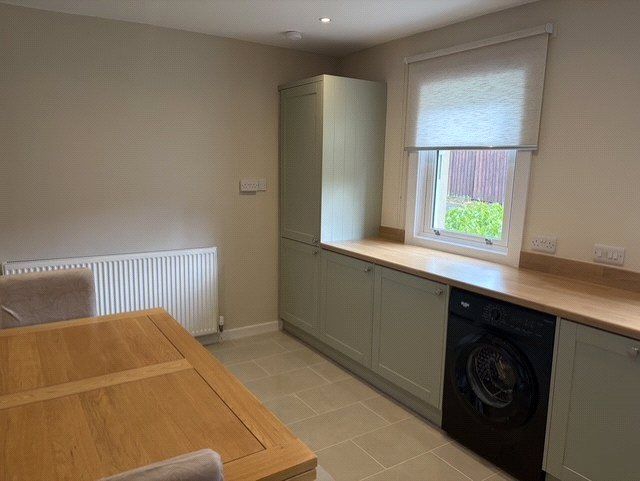 Property photo 3 of 12 Dining Kitchen