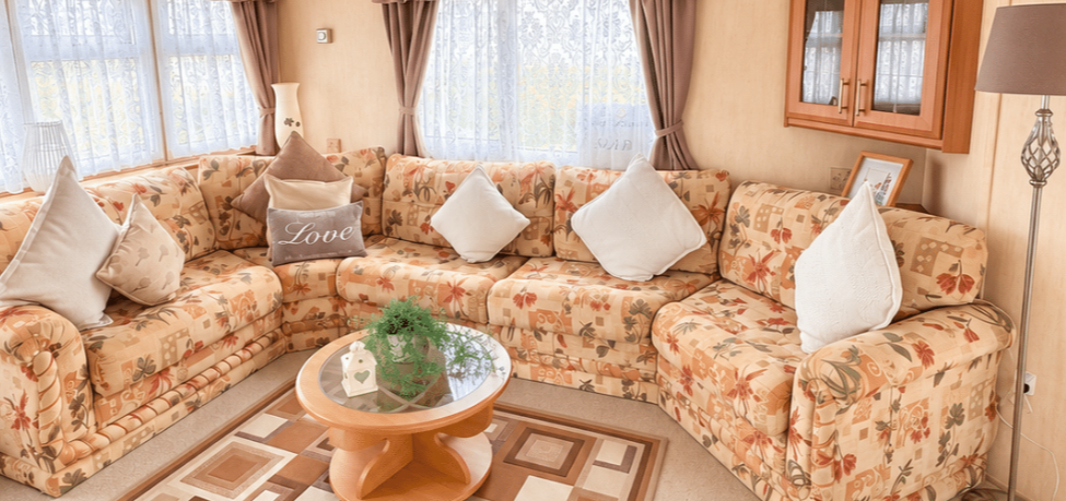 Property photo 3 of 13 Comfortable Floral Corner Sofa With Cushions And Glass Topped Coffee Table