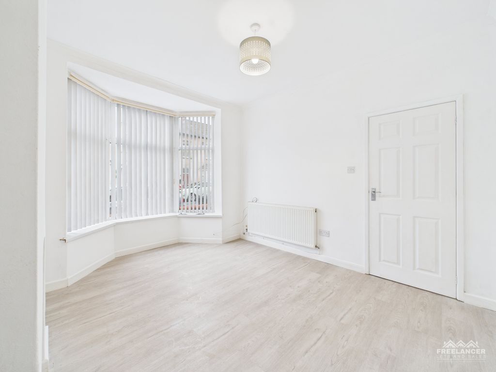 Property photo 3 of 13 Living Room 2