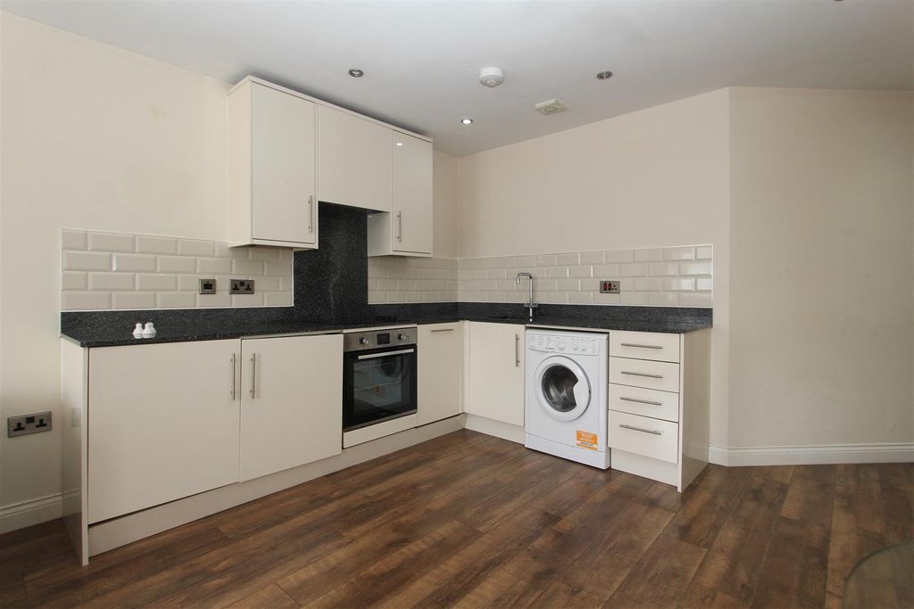 Property photo 2 of 5 Modern Kitchen With Sleek Units And Appliances...