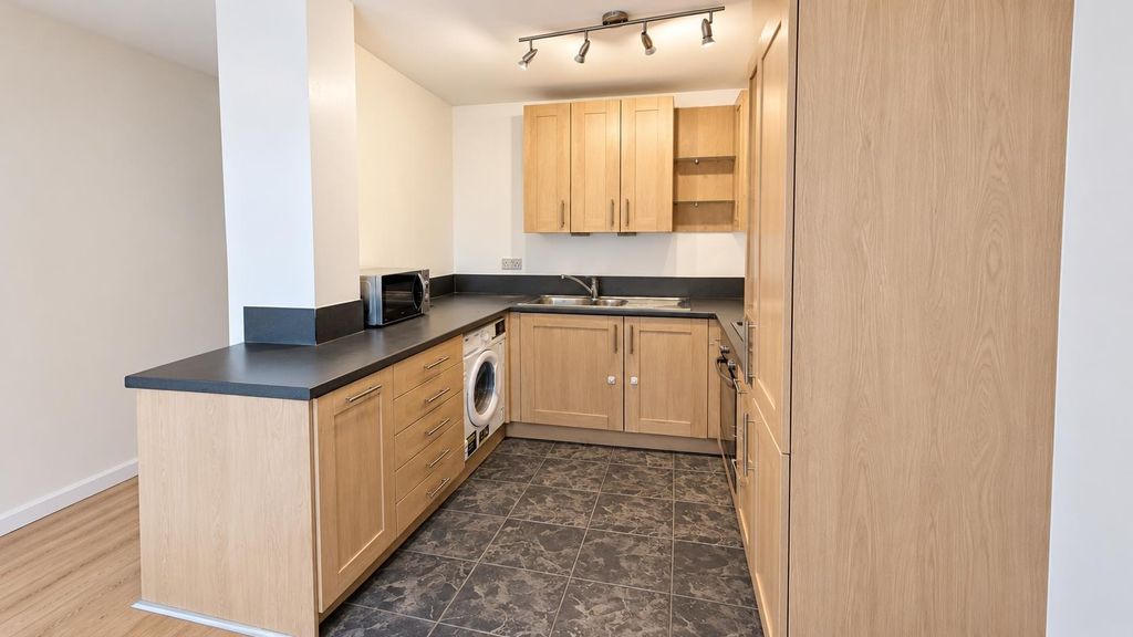 Property photo 3 of 9 Modern Fitted Kitchen With Ample Storage...