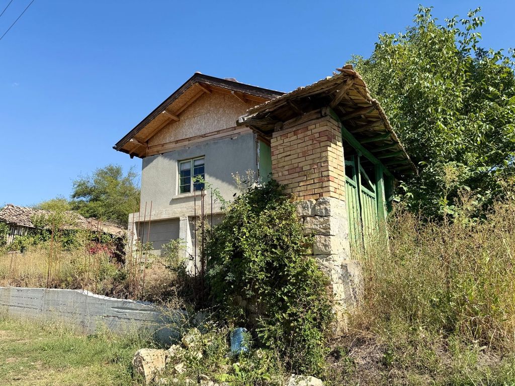 Property photo 2 of 52 Side Perspective Of The Old House With Surrounding Overgrown Plants And A Small Brick Outbuilding With Tiled Roof.